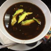 Black Bean Soup · Topped with feta and avocado.