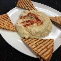 Hummus Platter · Homemade hummus with toasted pita bread.