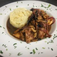 Chicken Marsala · Sauteed chicken in Marsala wine and wild mushrooms. Served with mashed potatoes.