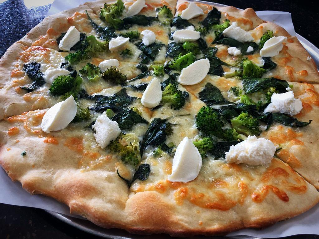 Medium New York White Pizza · Ricotta base, spinach, broccoli and garlic.