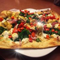 Gluten Free Spinach Flatbread · Spinach, roasted red pepper, artichokes, goat cheese, and onions.
