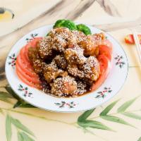 Sesame Chicken · Chunks boneless chicken sauteed with special brown sauce and fresh sesame seeds topping. Hot...