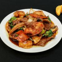 H5. Happy Family · Jumbo shrimp, lobster meat, sliced pork, beef, chicken and mixed vegetables in brown sauce.