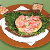 1. Aguacate Relleno con Camarones · Stuffed avocado with shrimp.