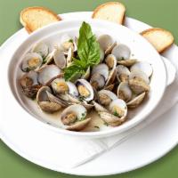 2. Almejas en Mantequilla · Butter clams.
