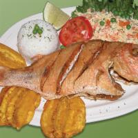 17. Pargo Rojo Frito · Fried red snapper, rice, salad & fried green plantains.