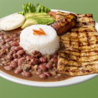 33. Lomo de Cerdo a la Parrilla · Aguacate, maduro, arroz y frijoles. Grilled pork loin, avocado, sweet plantain, rice and bea...