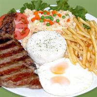 62. Steak de la Casa · 1/2  grilled sirloin steak, rice, salad, french fries and egg.