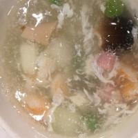 S7. Chinese Ham With Winter Melon Soup 八寶冬瓜湯 · Guord soup.
