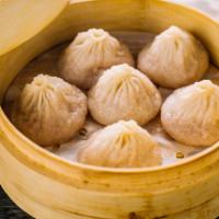 A3. Crab Meat w.Pork Steamed Soup Buns (6) 蟹粉小籠包 · 