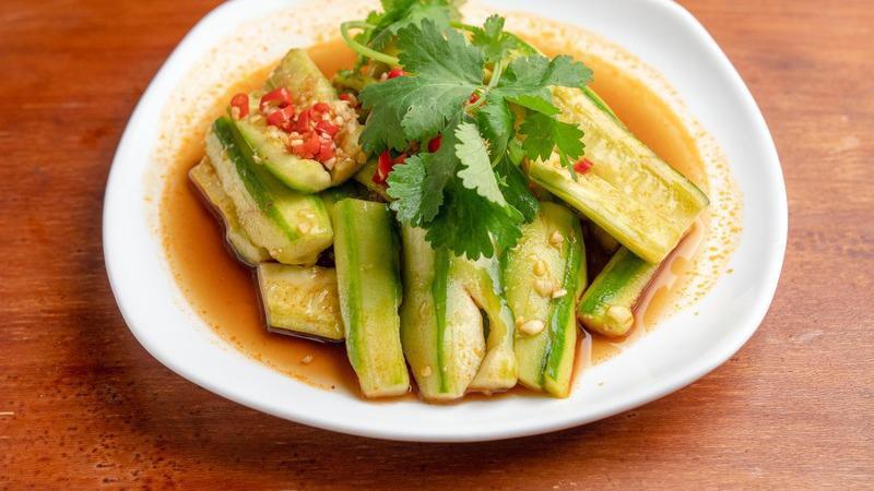 A15. Cold Marinated Baby Cucumber 涼拌小黃瓜 · Cucumber mixed with dressing. 
