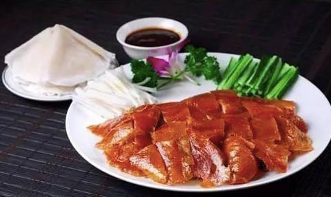 C2. Beijing Roast Duck 北京鸭 · crispy thin roasted duck served with spring onions, cucumber, sweet bean sauce, and Chinese pancakes on the side 