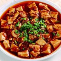 V9. Bean Curd Szechuan-Style 麻婆豆腐 · Served with minced pork. Spicy.