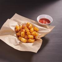 Tater Tots · Crispy tots served with our tangy marinara dipping sauce.