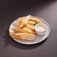 Dipsticks · 6 big, handmade dipsticks baked fresh and served with your choice of dipping sauce.