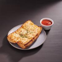 Schmeezy Bread · Fresh-baked bread, blasted with cheesy garlic goodness and served with a side of marinara du...
