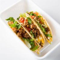Tacos · 3 crispy corn, soft flour or corn tortillas; rice and beans served on the side.
