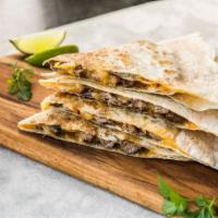 Quesadilla Plate · Large flour tortilla stuffed with melted cheeses and choice of grilled chicken, steak or com...