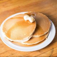 Buttermilk Pancakes · Extra fluffy pancakes served with your choosing.