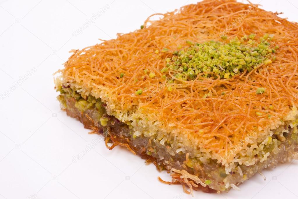 62. Kadayif · Shredded pastry with mixed nuts, syrup and ground pistachio topping.