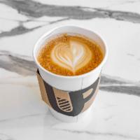 Cappuccino · A double shot of espresso with foamed steam milk