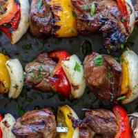 Kabobs (Beef, Chicken, or Veggie) · Two skewers packed with 4 oz. of char grilled Steak, Chicken Breast, or Mushrooms , bell pep...