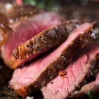 Grilled Steak Strips · A 6 oz. marinated steak seasoned seasoned in-house, grilled to perfection, and sliced into s...