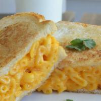 Mac N’ Cheese Grilled Cheese · A hearty cheddar cheese grilled cheese sandwich stuffed with our in-house country style Mac ...