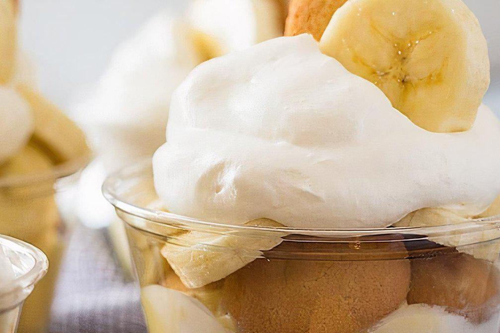 Banana Pudding · Made fresh, in-house, with layers of cookies (vanilla wafer and Chessmen cookies), sliced bananas, and vanilla custard folded with whipped cream.