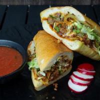 A la Mexicana Grilled Sandwich · Beef, sauteed jalapenos, onions and tomatoes. Served in a 6-inch white baguette with mozzare...