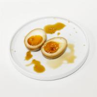 Marinated Egg · Soil-boiled egg marinated in house-made 13 spices marinate with sesame.