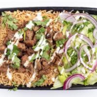 Lamb over Rice · Grilled lamb, with basmati rice, cilantro, onions, and sauce.