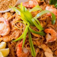 53. House Special Pad Thai Noodles · Thin rice vermicelli noddles stir fried with onion, bean sprout, carrot, egg chives, lime an...
