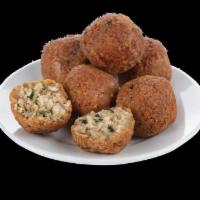 Boudin Bites · Rice and pork mixed with a blend of Cajun seasonings, rolled and battered to perfection!