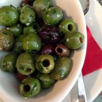 Stuzzichini · Marinated olives, pecorino cheese and fried artichokes