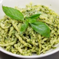 Orecchiette al Pesto · Homemade ear shape pasta with basil pesto sauce.