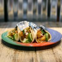Basket of 3 Baja Fish Tacos · Lightly battered white fish, made 