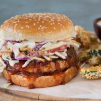 Crispy Pork Chop Burger · Thick cut of meat from a pig typically cut from the spine.