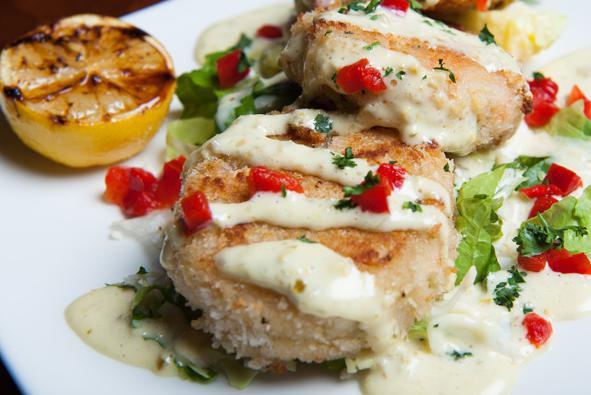 Crab Cakes · Beurre blanc and creole remoulade sauce.