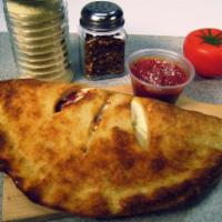 Chicken Calzown · Pizza sauce, mozzarella & ricotta cheese baked in a fresh dough shell.
