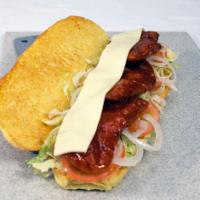 Buffalo Chicken Sub · Chicken fingers dipped in you choice of wing sauce with ranch or bleu cheese, lettuce, tomat...