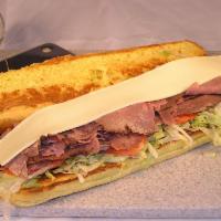 Roast Beef Sub · Freshly toasted bakery roll with fresh lettuce, onions, tomatoes, white American cheese and ...