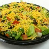 Garden Salad · Freshly made with lettuce, diced tomatoes, onions, green peppers, black olives, shredded car...