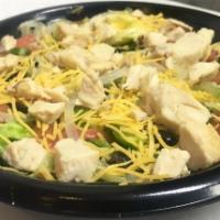 Grilled Chicken Salad · Freshly made with lettuce, diced tomatoes, onions, green peppers, black olives, shredded car...
