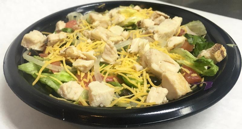 Grilled Chicken Salad · Freshly made with lettuce, diced tomatoes, onions, green peppers, black olives, shredded carrots, red cabbage, grilled chicken, and American cheese.