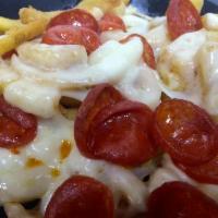 Pizza Fries · Includes a choice of dipping sauce.