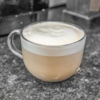 Latte · Espresso milk or milk alternative, some foam.
