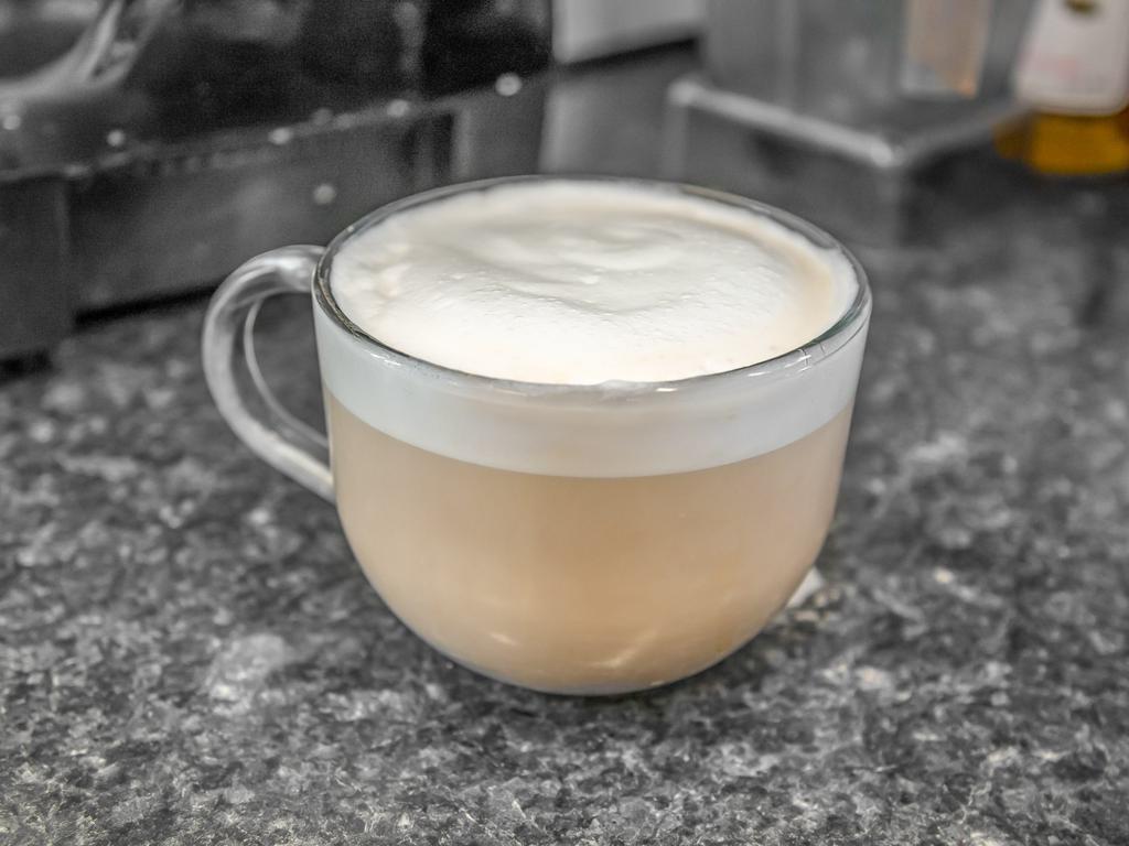 Latte · Espresso milk or milk alternative, some foam.