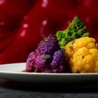 Cauliflower · purple, orange & green florets, kung pao, chilis, scallion