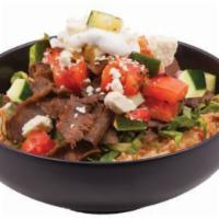 Greek Bowl · Our signature gyro meat, feta cheese, tomato and cucumber salad and z-sauce all over fresh l...